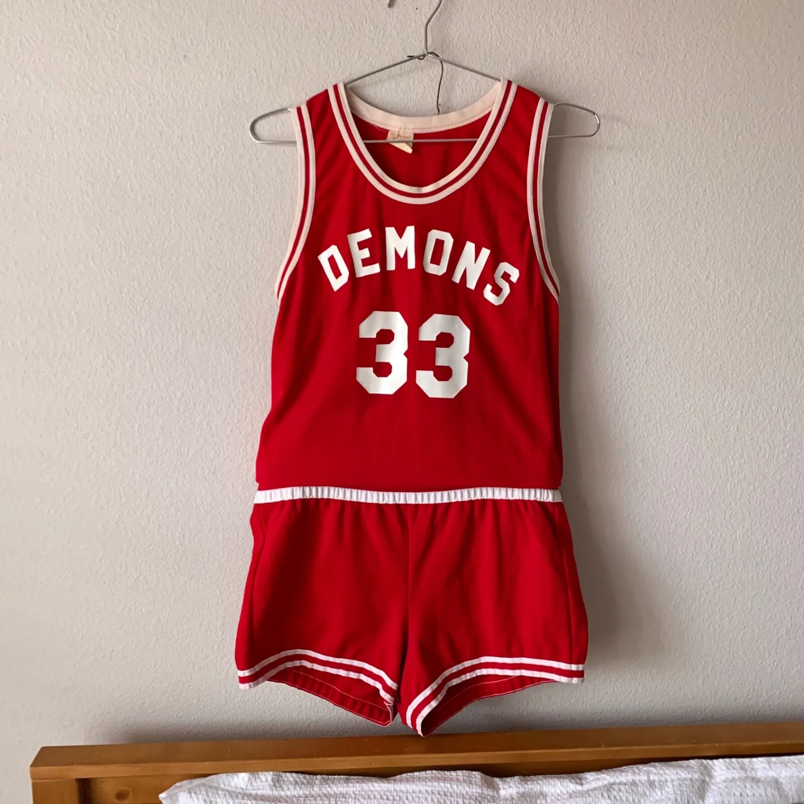 True vintage 1970s red basketball uniform - jersey and shorts demons number 33